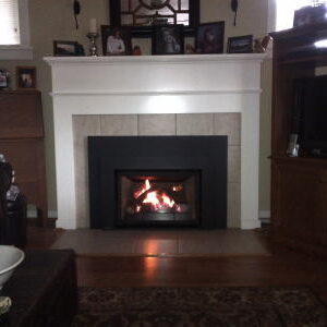 Gas insert with oversized surround